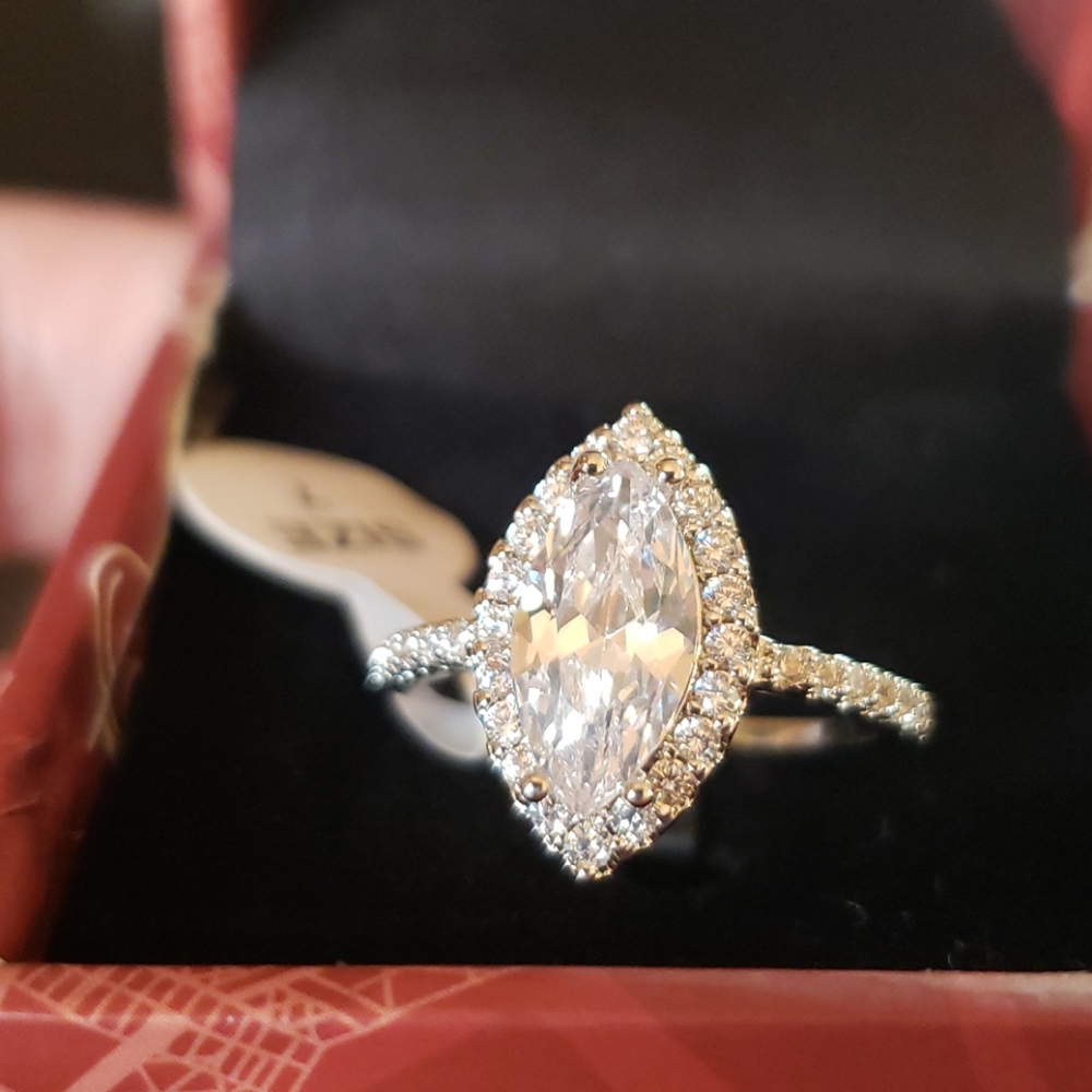 Ring 18kt white gold plated brass size 7